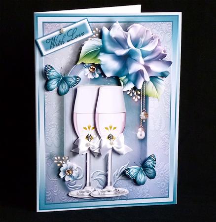 Champagne Glass's with Light Blue Roses by Denise Murray