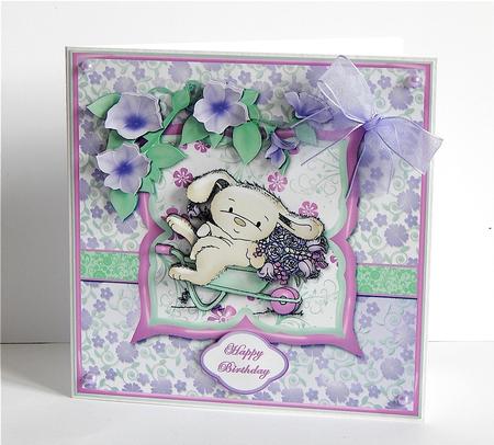 Wheelbarrow Bunny Floral Card Front by Denise Murray