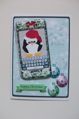 Green phone with penguin and bow, snowflakes and baubles background by Denise Mynard