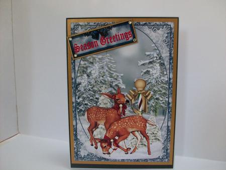 Reindeers in the Snow by Denise Mynard
