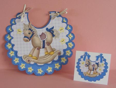 Lovely Rocking Horse with Stars on a Blue Bib by Diana Holmes