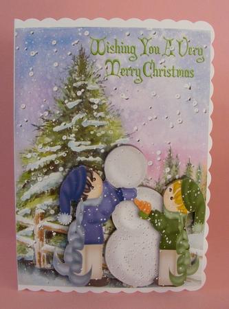 Boys in the Snow Building a Snowman by Diana Holmes