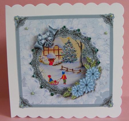 8x8 Sledging in the Snow with Blue Frame and Flowers by Diana Holmes