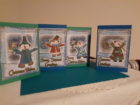 4 Christmas Toppers/ Santa,Snowmen, candle and elf by Diane Carbis