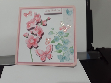 Pink flowers and butterfly 7x7 by Diane Carbis