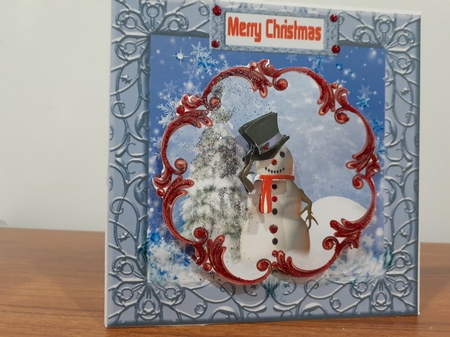 A lovely snowman design with matching tags  by Diane Carbis