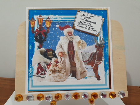 Santa s on his way card front by Diane Carbis