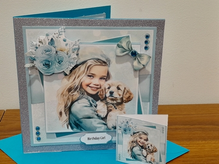 A Girl And Her Puppy by Diane Carbis