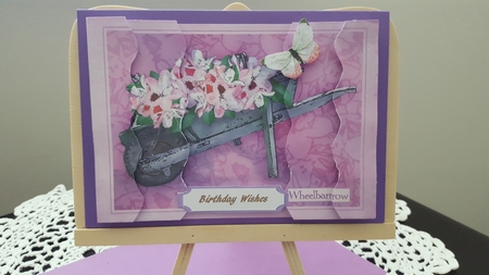 Flower Filled Wheelbarrow Wavey Edged Side Stacker by Diane Carbis