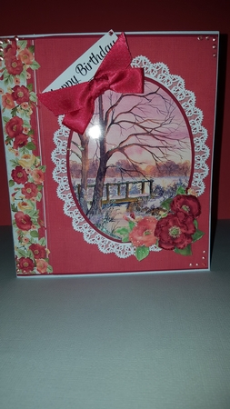 Winter Sunset card topper with Poppy and bow decoupage by Diane Carbis