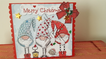Trio of santas elves with bow and star pyramids (blue) by Diane Carbis
