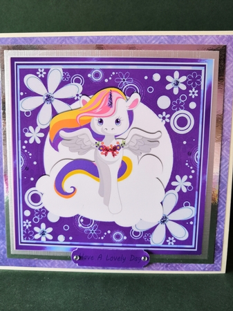 Rainbow unicorn in purple floral 7x7 frame by Diane Dawson