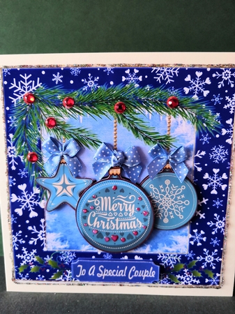 Blue shaped Christmas baubles card front by Diane Dawson