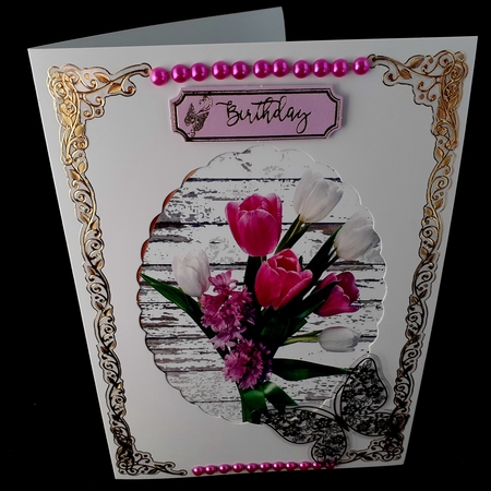 Two pretty spring flower toppers coloured tulips with green/pink bows by Diane  Hitchcox
