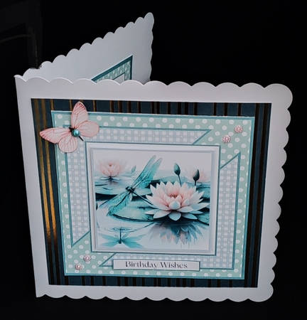 Dragonflies and Lily Pads by Diane  Hitchcox
