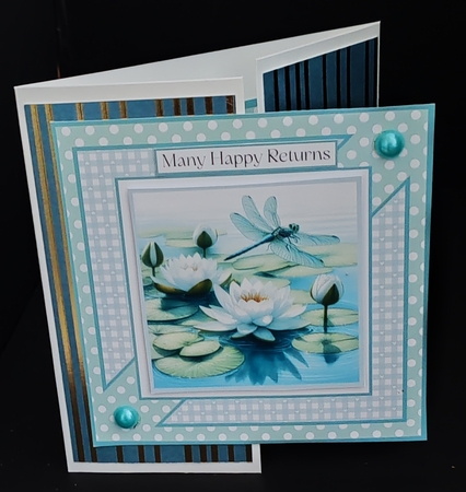 Dragonflies and Lily Pads by Diane  Hitchcox