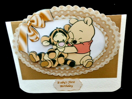 Little bear hugging a tiger with bow in oval gingham frame by Diane  Hitchcox
