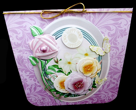 Pink and cream flowers in oval frame by Diane  Hitchcox