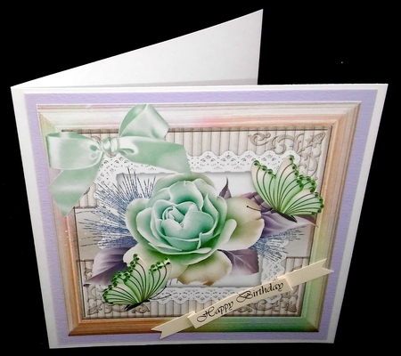 beautiful turq roses with butterflies in turq rainbow frame 8x8 by Diane  Hitchcox