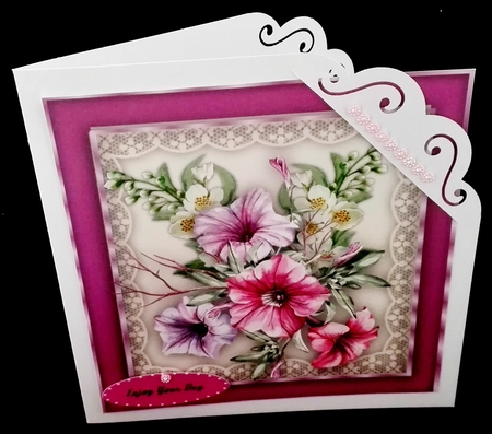 Beautiful Petunias and Jasmin  on a lace mat  by Diane  Hitchcox