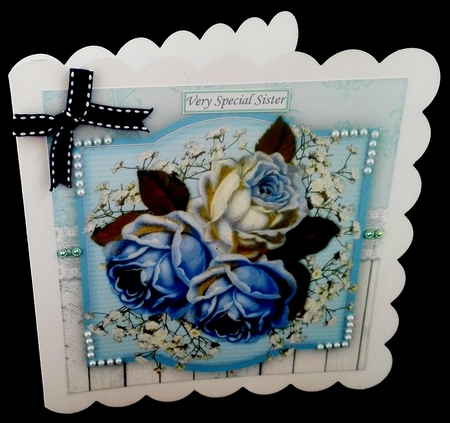 Blue Roses and Babys Breath by Diane  Hitchcox