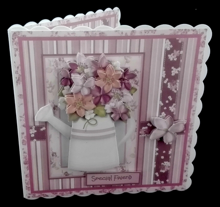 Flowers in a watering can by Diane  Hitchcox
