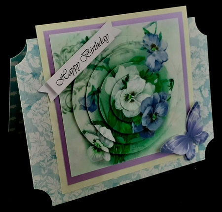 Pretty pink and green pansies with bow circle pyramids by Diane  Hitchcox
