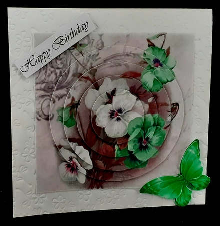 Pretty lilac and white pansies with bow circle pyramids by Diane  Hitchcox