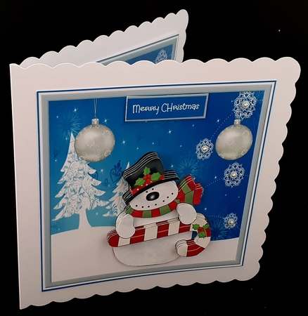 Snowman and holly cane by Diane  Hitchcox
