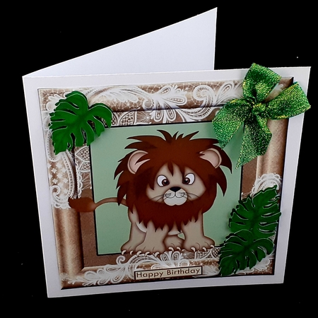 Lion in ornate frame with palm leaves 8x8 by Diane  Hitchcox