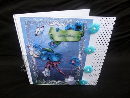 Blue Petunias and Butterflies by Diane  Hitchcox