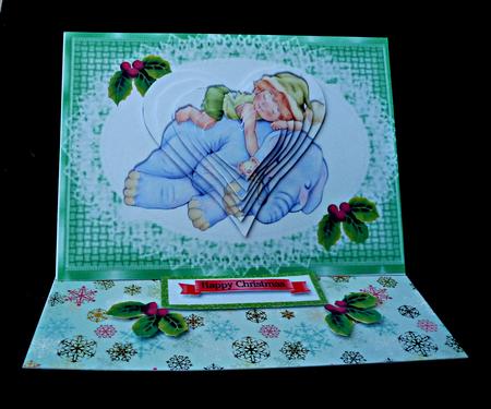 Little Boy in Santa Hat with Friend Ele, Heart Pyramids by Diane  Hitchcox