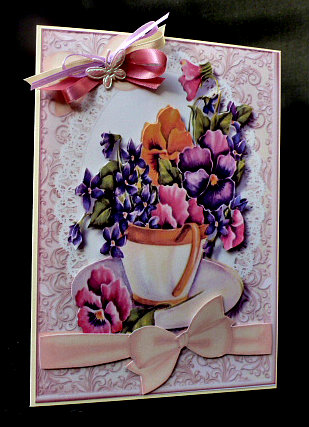 Beautiful Cup of Pansy's by Diane  Hitchcox