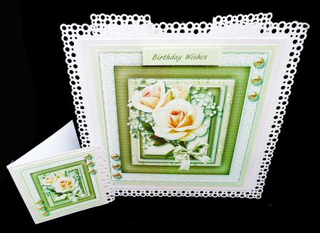 Cream Roses and Baby's Breath  by Diane  Hitchcox