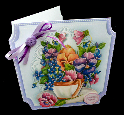 Lovely Cup of Pansy's and Violets  by Diane  Hitchcox
