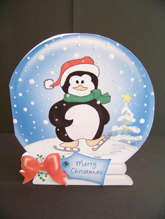 Xmas Skating Penguin Snow Globe by Diane Moore