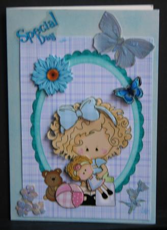 Pretty Girl in Blue Frame with Blue Flower by Diane Sixsmith