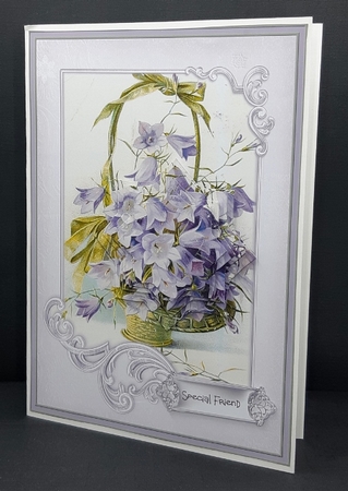 Basket of purple flowers A5 by Diane  Vermeer