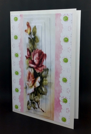 Pretty cascading vintage roses with vintage lace pyramids by Diane  Vermeer