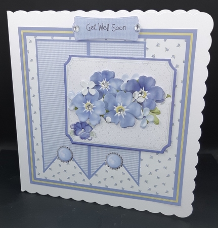 blue flowers and ribbons by Diane  Vermeer