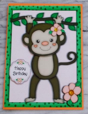 Gorgeous Monkey with a Pink Flower by Diane  Vermeer