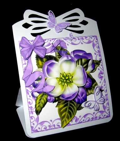 Pretty purple flower in ornate scroll frame with organza bow by Dianne Jackson