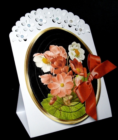 Pretty flower arrangement with bow oval pyramids by Dianne Jackson
