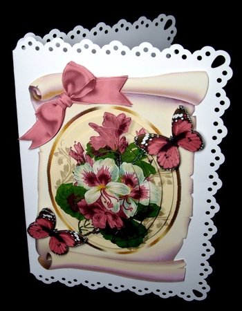 pretty pink fuchsia on a scroll with butterflies, and bow oval pyramids by Dianne Jackson