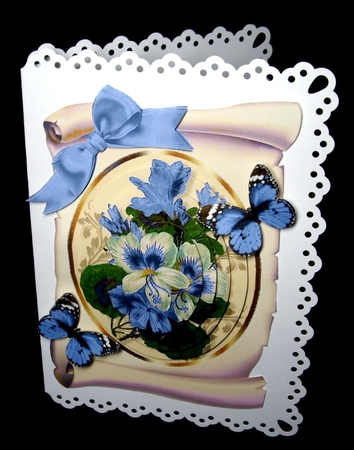pretty blue fuschia on a scroll with butterflies, and bow oval pyramids by Dianne Jackson