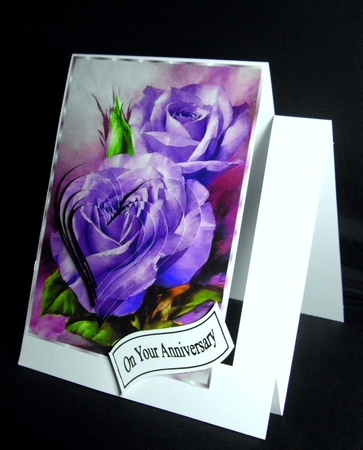 pretty A5 purple roses in heart pyramids with organza bow by Dianne Jackson