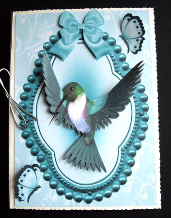 Humming Bird with Butterflies by Dianne Jackson