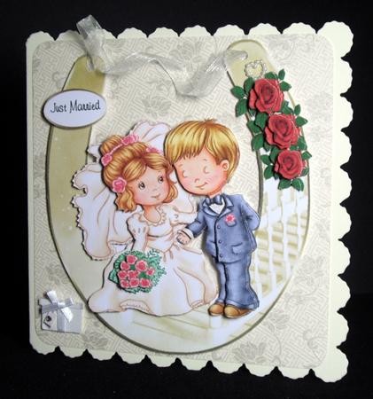 Cute Horseshoe Keepsake Couple by Dianne Jackson
