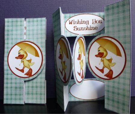 Umbrella Ducks Circle Pop Out by Donna Ritchie