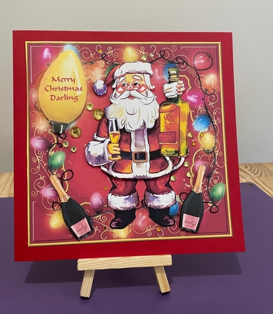 Santa getting lit card front by Doreen Bell
